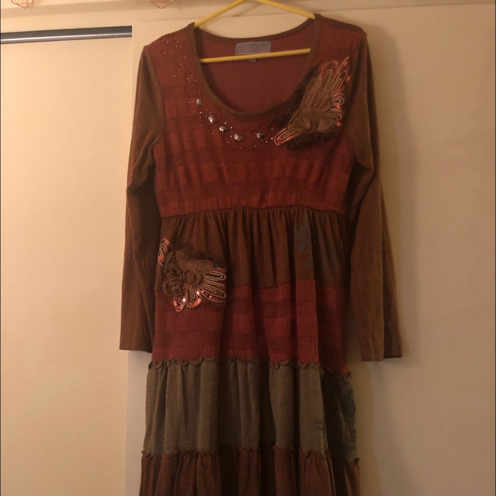 Unique appliqués and lovely fall colors in a comfy cozy cotton dress.
